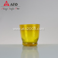 Amber color glossy glass mug wine cup